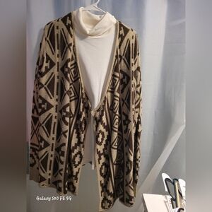 A two piece, a turtle neck long-sleeved and a sweater pull over